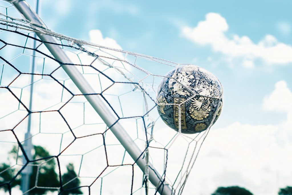 Football on the pitch symbolising Aston Villa's season of wins and losses