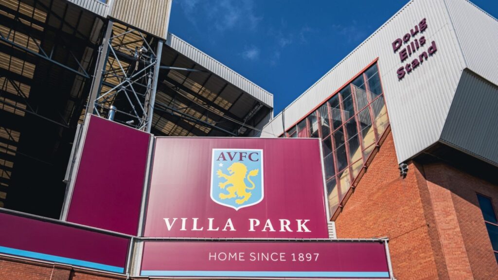 aston villa transfer news: Exterior view of Villa Park stadium showing the Aston Villa FC crest and Doug Ellis Stand
